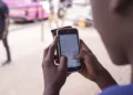 Student-using-mobile-phone-