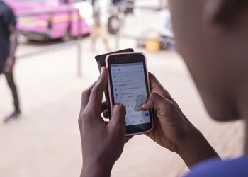 Student-using-mobile-phone-
