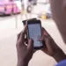 Student-using-mobile-phone-